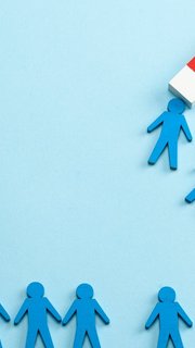 Personnel recruitment and a magnet attracts good employee leaders. Blue background