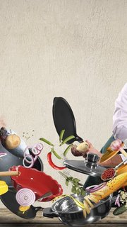 Cheerful chef drumming on pots