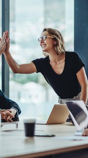 Group of colleagues celebrating success
